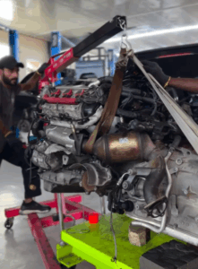 Audi A6 engine inspection during replacement at The Car Lab