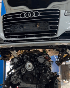 Audi A6 on the lift for engine replacement at The Car Lab Dubai