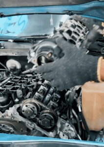 Dodge Charger engine components laid out for repair at The Car Lab Auto Repair Center in Dubai