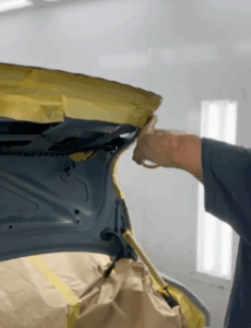 Expert technicians working on BMW 7 Series G70 full paint and base coating in Dubai