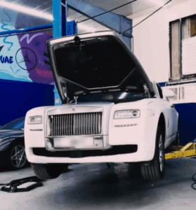 Rolls-Royce Ghost undergoing a thorough safety inspection by expert technicians in Dubai