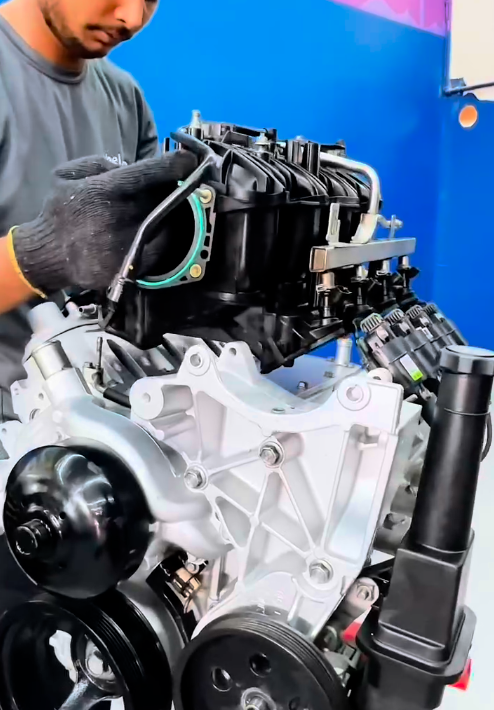 Skilled mechanics performing engine replacement on Hummer H3 in Dubai