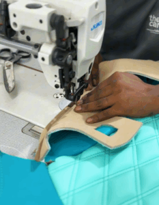 Technician performing Mini Cooper S upholstery services