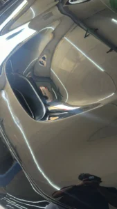 Ferrari 296 GTB bonnet restoration with factory-quality repaint and panel finishing in Dubai