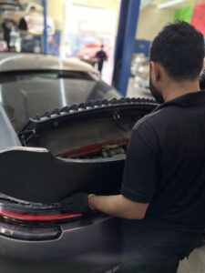 Porsche 911 Carrera coolant tank replacement service in Dubai