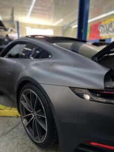 Porsche 911 Carrera cooling system repair and coolant tank replacement
