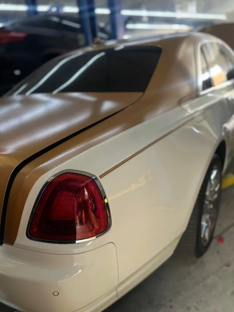 Rolls Royce Phantom undergoing spark plugs replacement and engine maintenance service in Dubai.