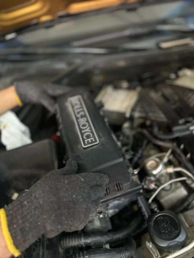 Rolls Royce Phantom engine air intake component inspected during minor service in Dubai.